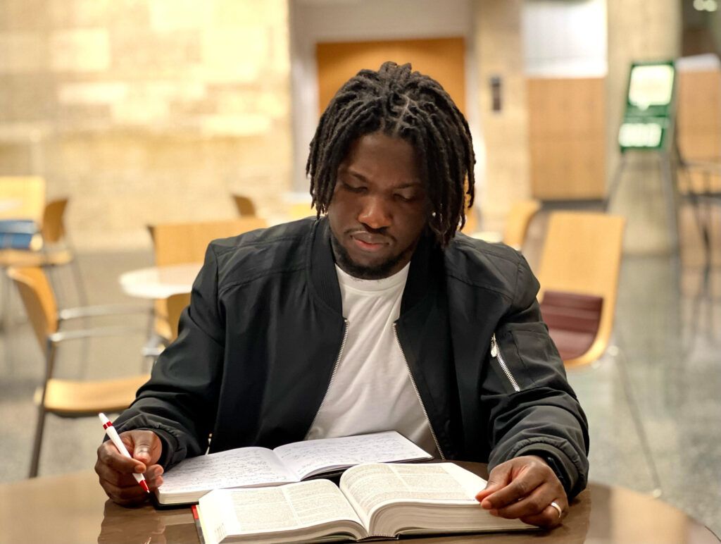 Jeremiah P. Mensah reading